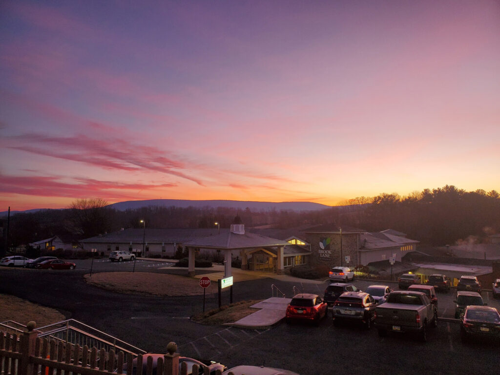 The Brook Lane campus at dusk